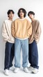 © Ceballos - Three young male models posing in streetwear fashion on white background