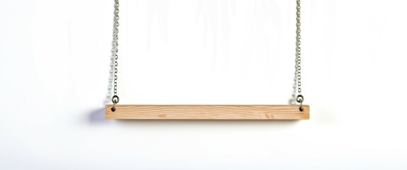 Photograph of a wooden swing hanging from two chains, centered in the frame, with a plain white background. The swing is rectangular with a smooth, light brown finish, and the chains are silver and me