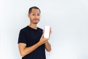 Men showing blank screen smartphone with black empty shirt on isolated white background