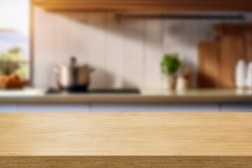 Wall Mural - Kitchen wood table top for product display with blurred modern interior. Wooden tabletop over defocused kitchen background. kitchen furniture and desk space. product promotion in the kitchen