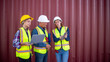 © APchanel - Engineer or dockworker working in the construction container dock yard checking and inspection containers data on computer program environment is container shipping Logistics business concept.