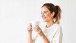 © Krasavina Alena - Young woman holding a cup of coffee with a happy smile against white background