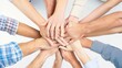 © Amien19 - Teamwork and Unity: Hands Clasped Together in a Symbol of Collaboration