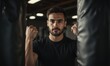 © Alex - Focused male boxer preparing for training