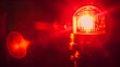 © KnotXian - red emergency light on the street and safety light