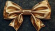 © Natchooda - Elegant gold bow and ribbon viewed from above on a transparent background, ideal for use in gift wrapping, invitations, and festive