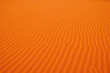 © CoveRipple - Vast sand dune with wind erosion patterns