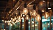 © Oisi - A cluster of vintage-style pendant lights hangs from a wooden ceiling fixture