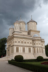 Wall Mural - Romania Curtea de Arges view on a cloudy summer day