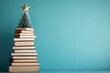 © Dina - A creative Christmas tree alternative using stacked books with a star on top, perfect for book lovers, minimal background with copy space