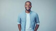 © Jelena - joyful portrait of a cheerful man in casual attire, hands in pockets, exuding happiness and confidence against a neutral backdrop