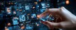 © Riko - Hand interacting with futuristic digital interface displaying data and analytics. Cyber technology and innovation concept.