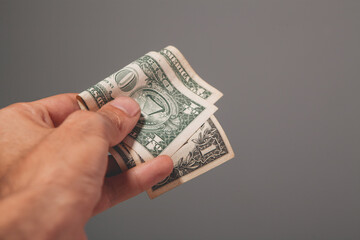 Wall Mural - man holding american dollar bills