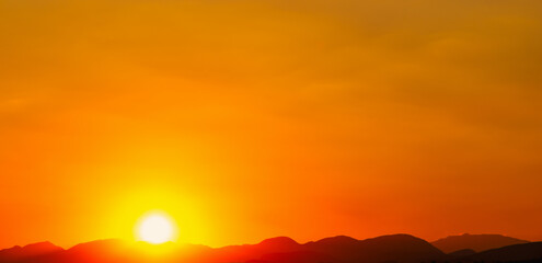 Wall Mural - Fiery orange sunset sky. Beautiful sky.