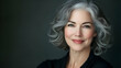 © charli - Confident mature woman with gray hair and a radiant smile  -
