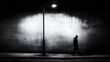 © Zoltan - A quiet alleyway with a single blurred figure walking under a streetlamp.