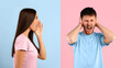 © Prostock-studio - Conflict, Quarrel, Family Relationship Problems. Angry lady screaming at man, mad guy grabbing his head with closed eyes and wide open mouth, covering ears with hands isolated on blue and yellow wall