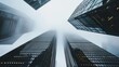 © Priyanut - Misty Metropolis: Skyscrapers pierce a thick fog, creating an enigmatic urban scene.
