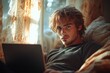 © zhuan - Focused young businessman pondering solutions at laptop in cozy minimalist workspace, navigating business challenges and exploring new strategies