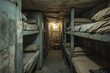© SY - Old, rusty bunk beds line a dimly lit corridor. Depicts confinement, hardship, or a historical setting.