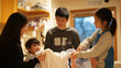 © Xplorer - Kids and parents folding laundry together, with a sense of cooperation and fun