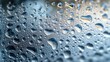 © Ummeya - Water droplets on glass surface texture.