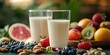 © Gular - Fresh, healthy milk paired with an assortment of fruits and nuts creates a nutritious breakfast. Enjoy the benefits of healthy milk combined with vibrant fruits and wholesome nuts for a perfect meal.