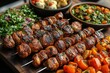 © Khawla - Middle eastern, arabic or mediterranean dinner table with grilled lamb kebab, chicken skewers with roasted vegetables and appetizers variety serving on wooden outdoor table. Overhead view