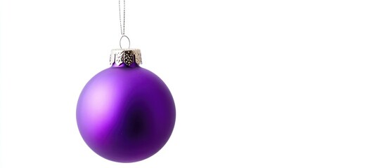 Poster - Elegant violet Christmas bauble with a glossy finish hanging against a clean white background for festive seasonal decoration concepts