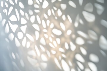 Poster - Abstract shadows projected onto a wall creating an organic, lacy pattern.