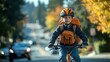 © xu - A young boy wearing a safety helmet rides his bike, carrying a bright orange school backpack, while crossing a quiet street on a sunny day, emphasizing child safety