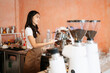 © Nuttapong punna - Startup successful small business owner sme woman stand with tablet  in cafe