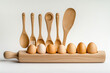 © Nick's Designs - A mockup of a kitchen background featuring baking and cooking utensils, eggs, and a rolling pin on a white background. Text space available, idea for a kitchen decor in a home. Wide banner
