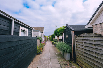 houses on street in scheendijk, netherlands