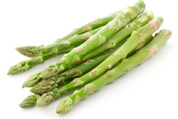 Fresh green asparagus spears are lying on a white background, ready to be cooked and enjoyed