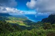 © Антон Сальников - A rainbow cascades over the Kalalau Valley along Kauai's Nā Pali Coast.