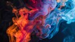 © Juan - Colorful flames of orange, yellow, and blue smoke swirling together