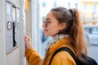© Pinklife - Profile view of a young woman wearing sunglasses and a backpack, standing outdoors with a confident expression, embodying adventure and a modern urban lifestyle.