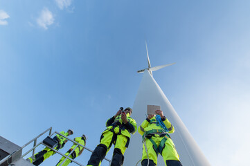 wind turbine maintenance and repair technician, engineer checking turbines working maintenance clean