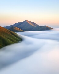 Wall Mural - Ethereal Morning in Foggy Mountain Valley with Layered Mist and Serene Atmosphere