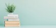 © Ryzhkov - Minimalist Study Setup Books and Plant on Pastel Background