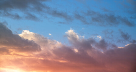 Wall Mural - sunset sky background. beautiful bright sunset sky with clouds.