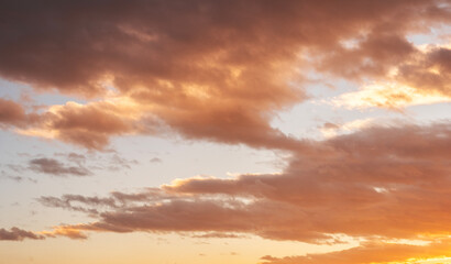 Wall Mural - sunset sky background. beautiful bright sunset sky with clouds.