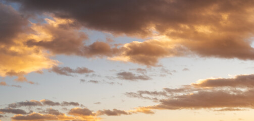 Wall Mural - sunset sky background. beautiful bright sunset sky with clouds.
