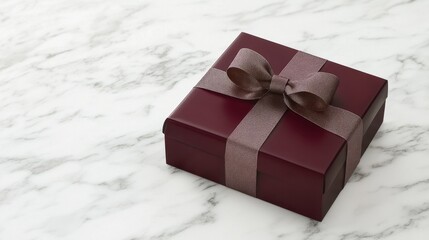 Wall Mural - Elegant Brown Gift Box with Ribbon on Marble Surface