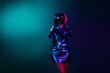 © deagreez - Photo of gorgeous young girl disco ball cover head empty space wear shiny dress neon light dark blue background