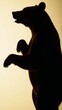 © Pixel Matrix - A bear silhouette stands alone against a backdrop