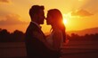 © junet - Silhouette of romantic couple at sunset soft bokeh