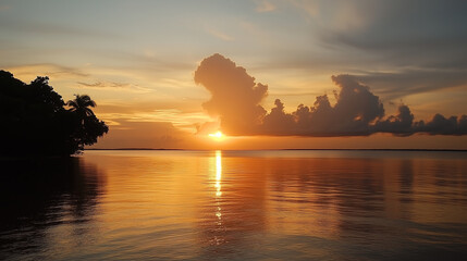 Wall Mural - sunset over calm waters with colorful clouds reflecting on the lake at dusk