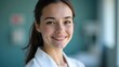 © speedfine - A young female doctor with a smiling face in a hospital